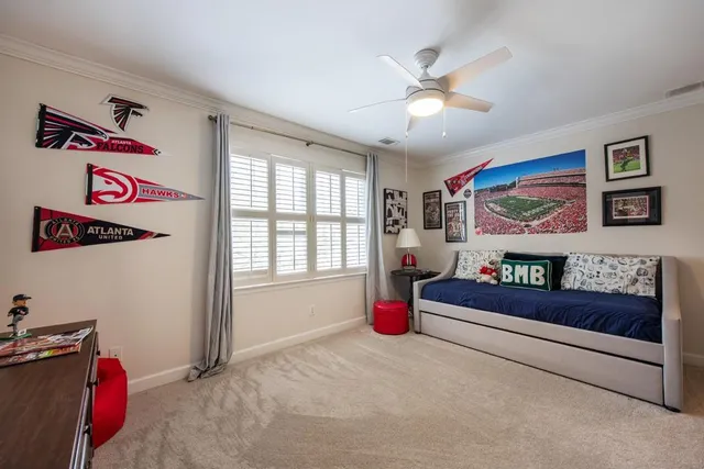 a bed room with a bed and a couch