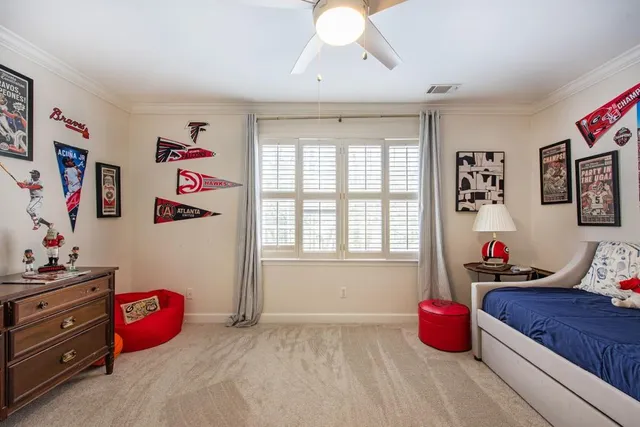 a bedroom with furniture toys and window