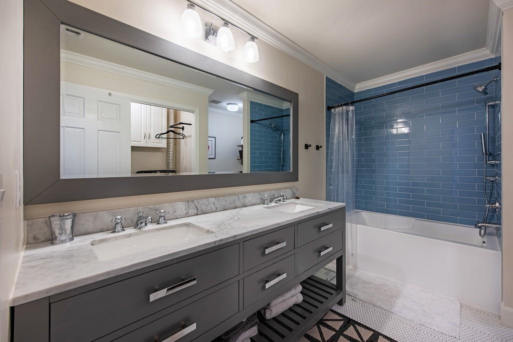 3211 Circle Oaks Drive Southeast Atlanta, GA 30339 - Photo 33 of 50 a bathroom with a granite countertop sink mirror and double