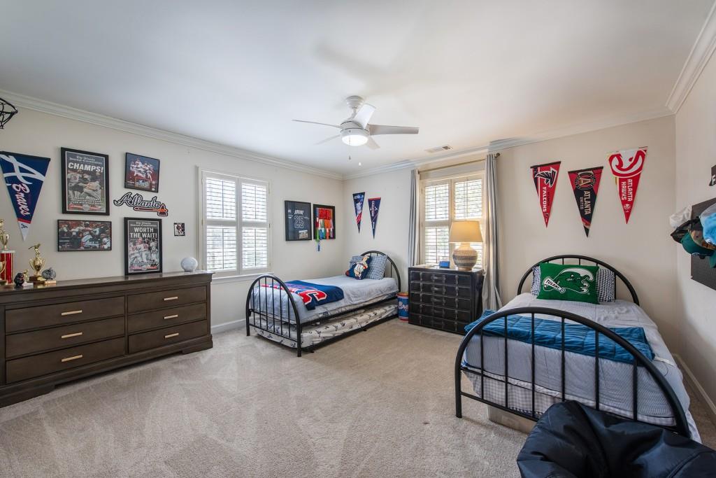 3211 Circle Oaks Drive Southeast Atlanta, GA 30339 - Photo 34 of 50 a bedroom with two beds and a window