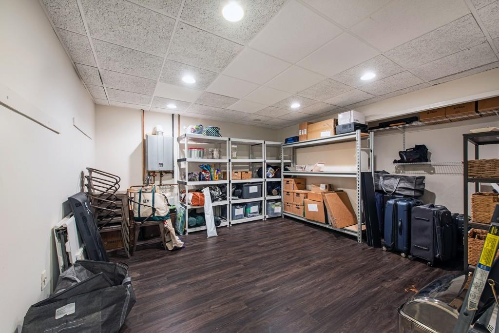 3211 Circle Oaks Drive Southeast Atlanta, GA 30339 - Photo 47 of 50 a view of a room with lots of wooden furniture and windows