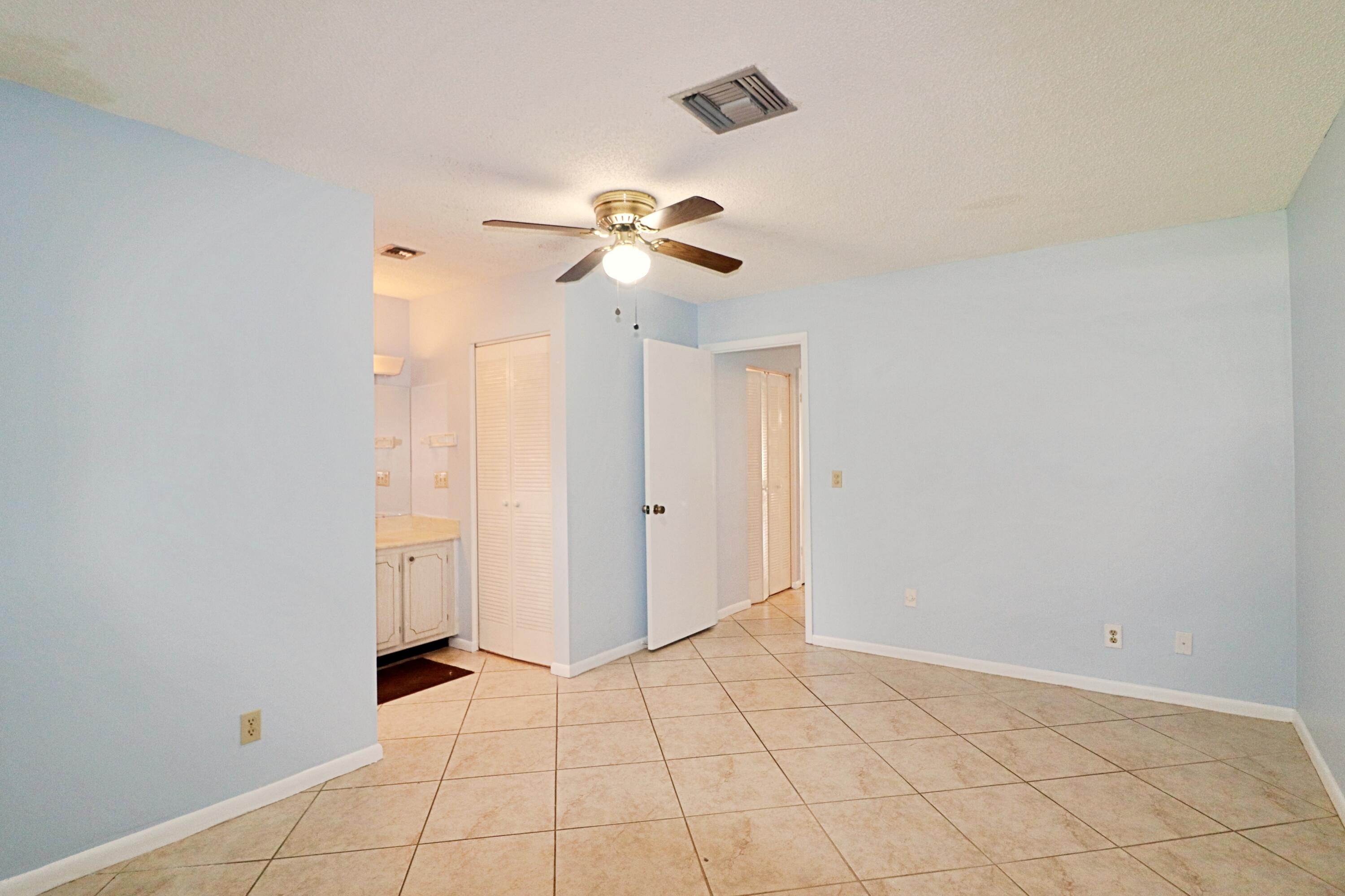 831 Timberview Drive, Unit C Fort Pierce, FL 34982 - Photo 12 of 18 a view of an empty room