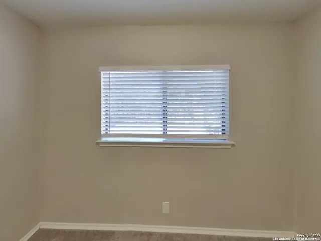 a view of a small space with a window