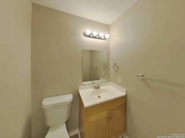 a bathroom with a sink and a toilet