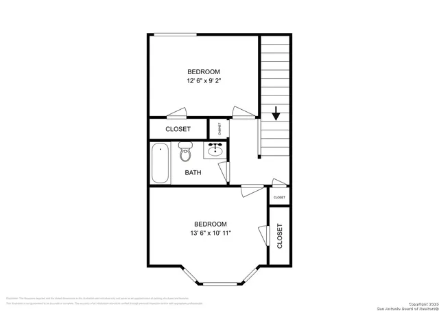 a picture of a bench in front of a wall