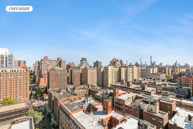 a view of a city with tall buildings