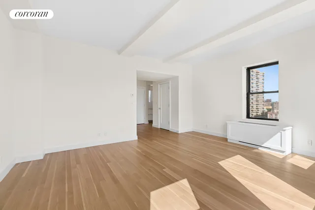 a view of an empty room and window