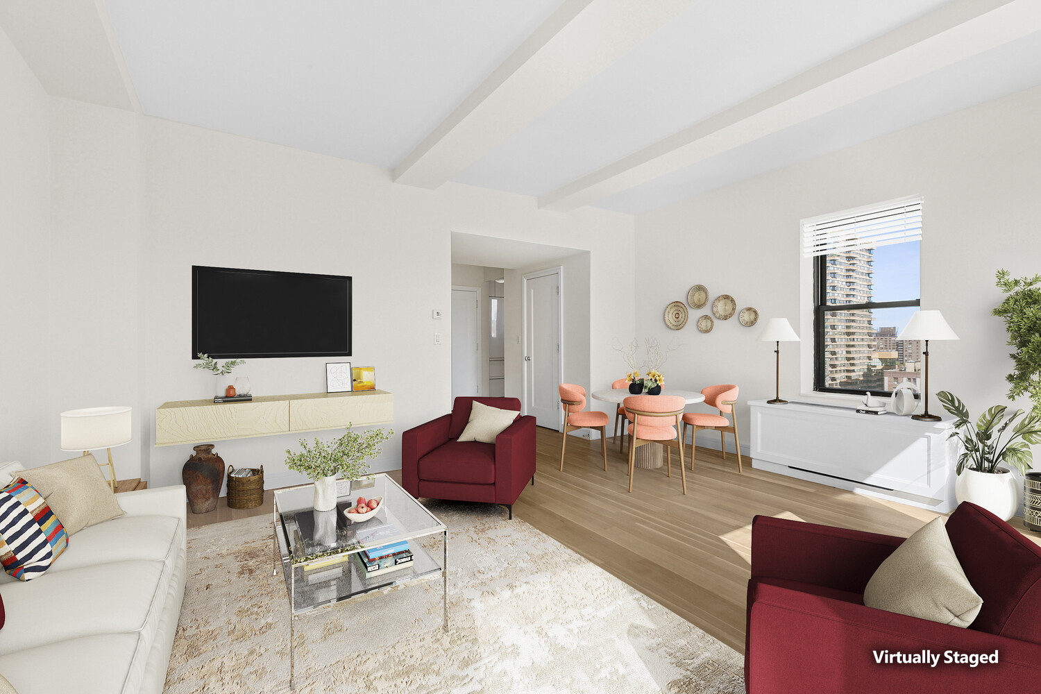 230 Riverside Drive, Unit 19L Manhattan, NY 10025 - Photo 16 of 18 a living room with furniture and a flat screen tv