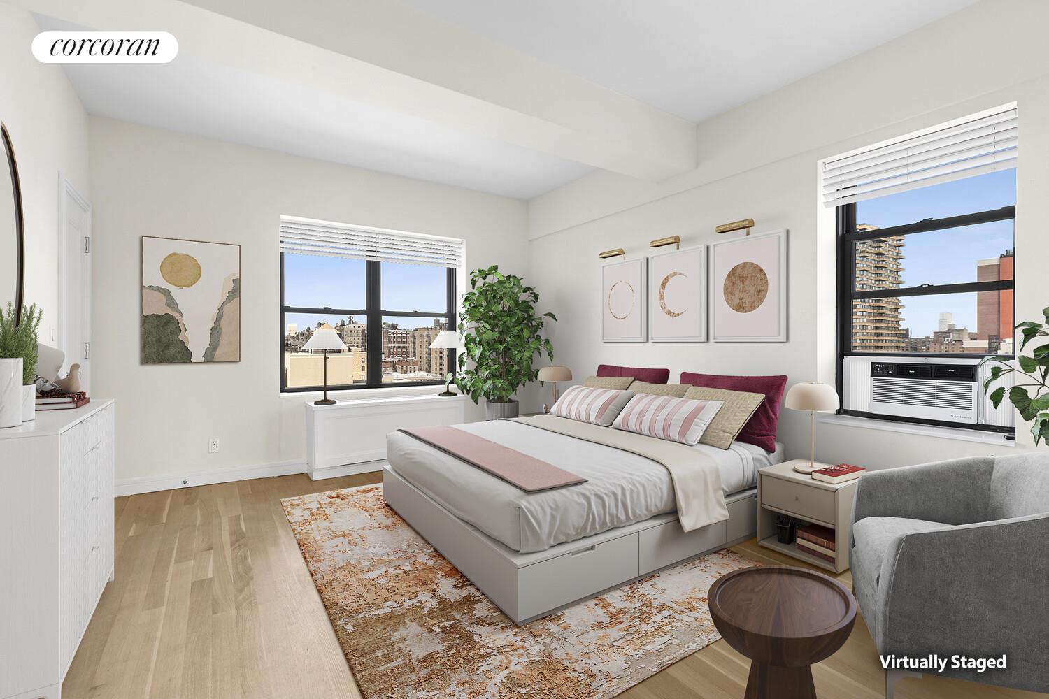 230 Riverside Drive, Unit 19L Manhattan, NY 10025 - Photo 4 of 18 a bedroom with a large bed and a window