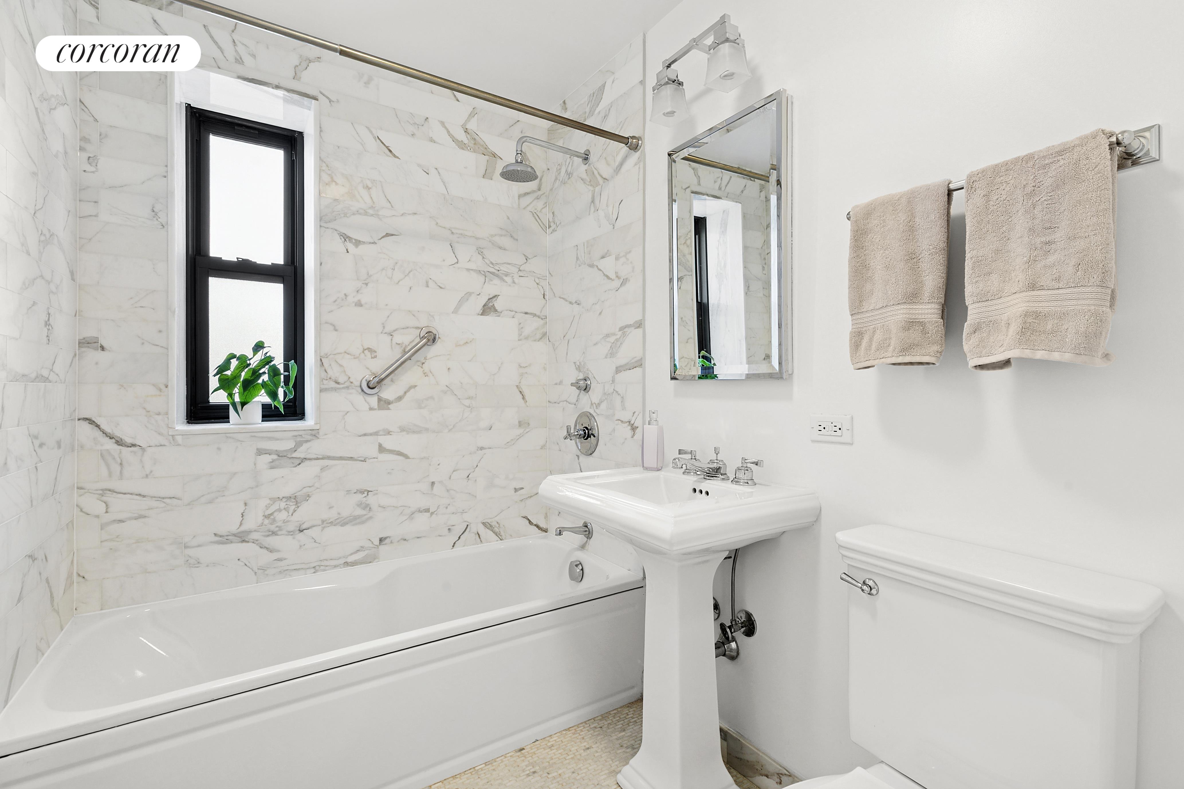 230 Riverside Drive, Unit 19L Manhattan, NY 10025 - Photo 7 of 18 a bathroom with a sink toilet and shower