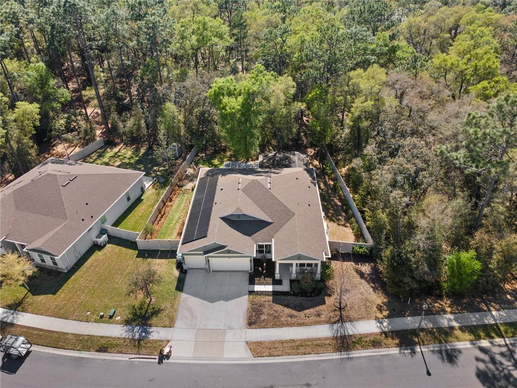 493 Nowell Loop DeLand, FL 32724 - Photo 2 of 33 an aerial view of a house with outdoor space
