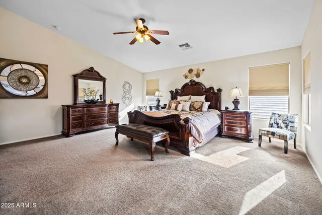 a bed room with a bed furniture and a window