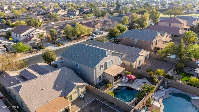 an aerial view of houses and roads