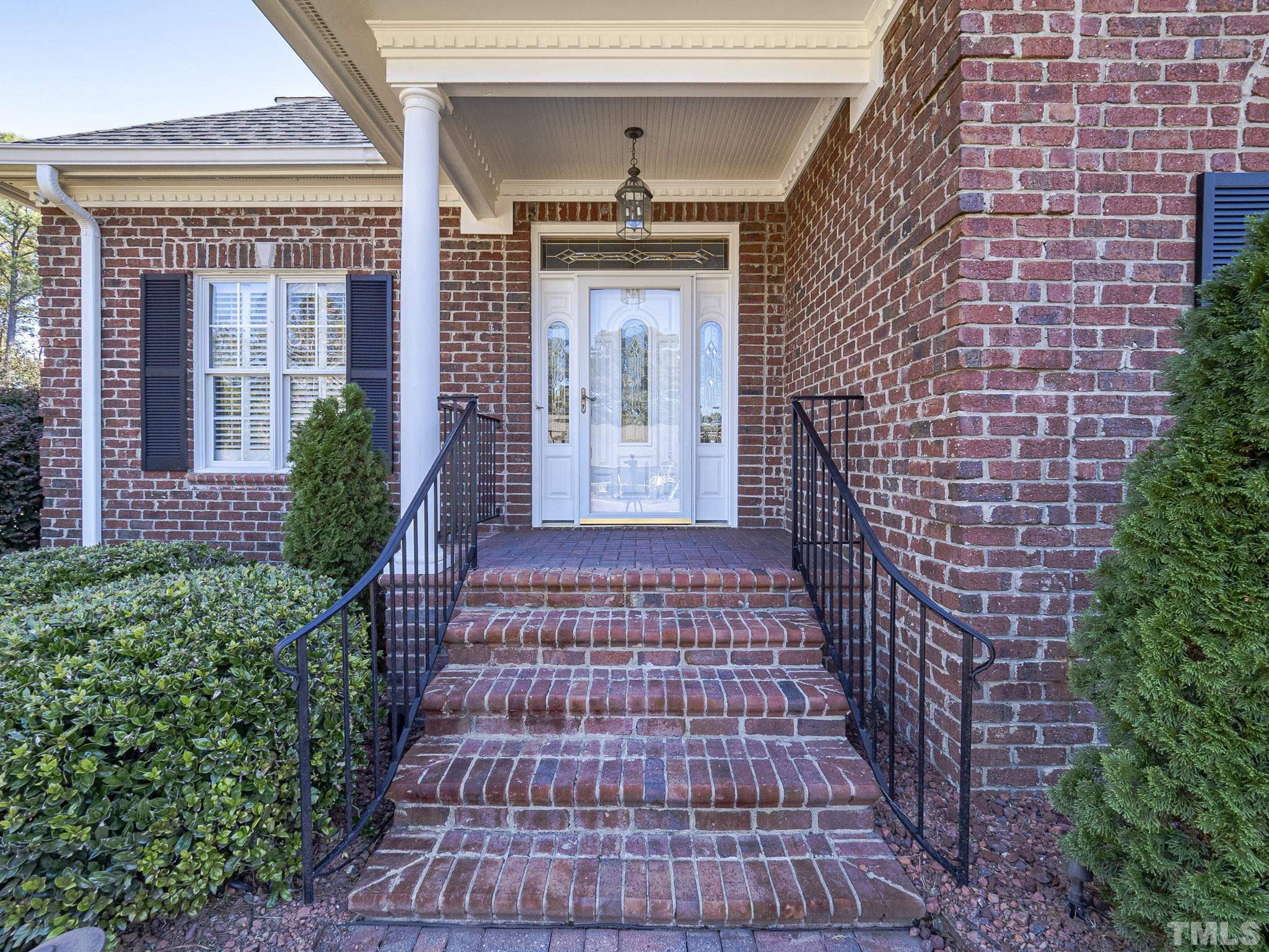 726 Pope Lake Road Angier, NC 27501 - Photo 2 of 29 a front view of a house with a yard
