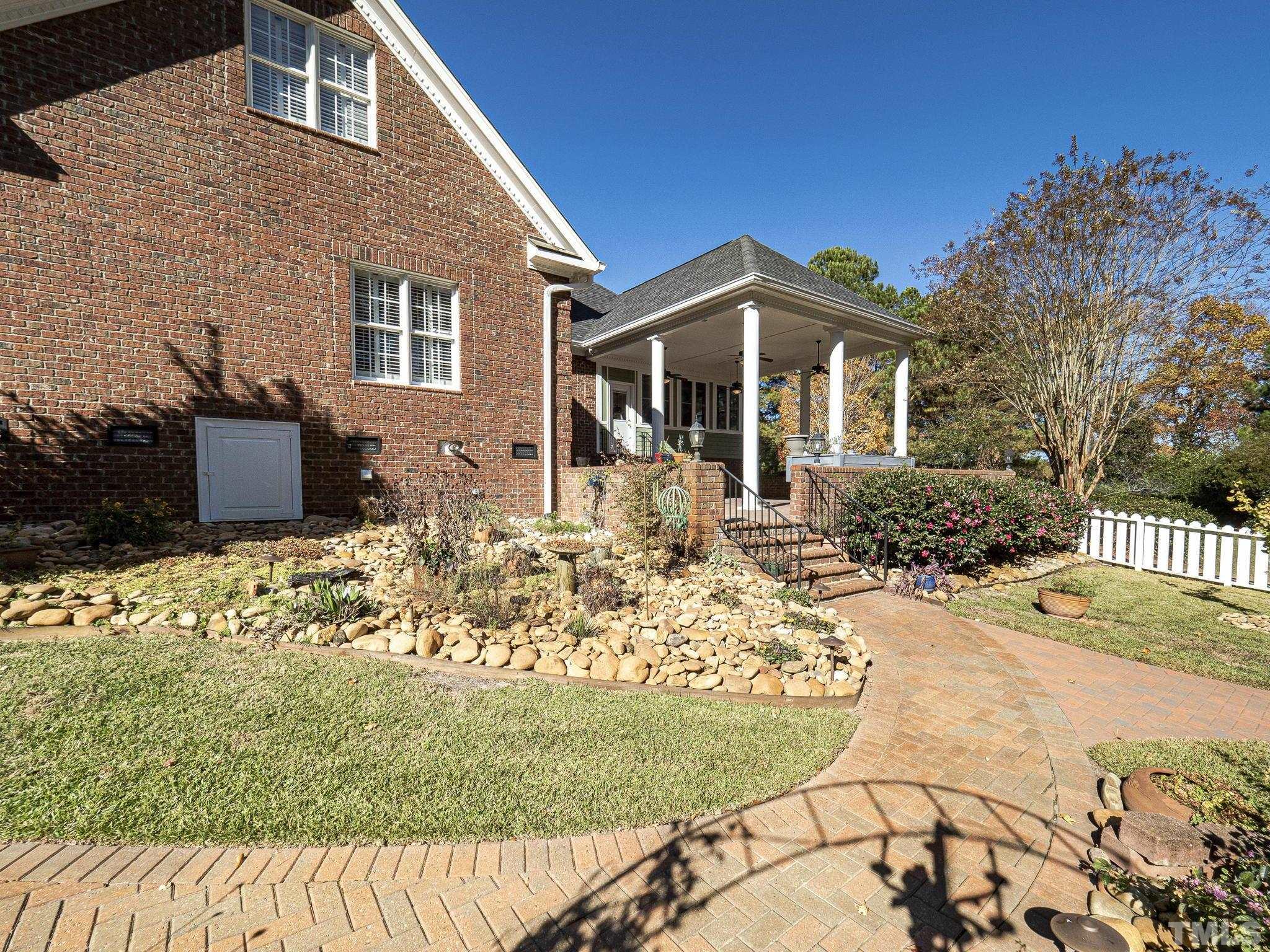 726 Pope Lake Road Angier, NC 27501 - Photo 3 of 29 a front view of a house with a yard