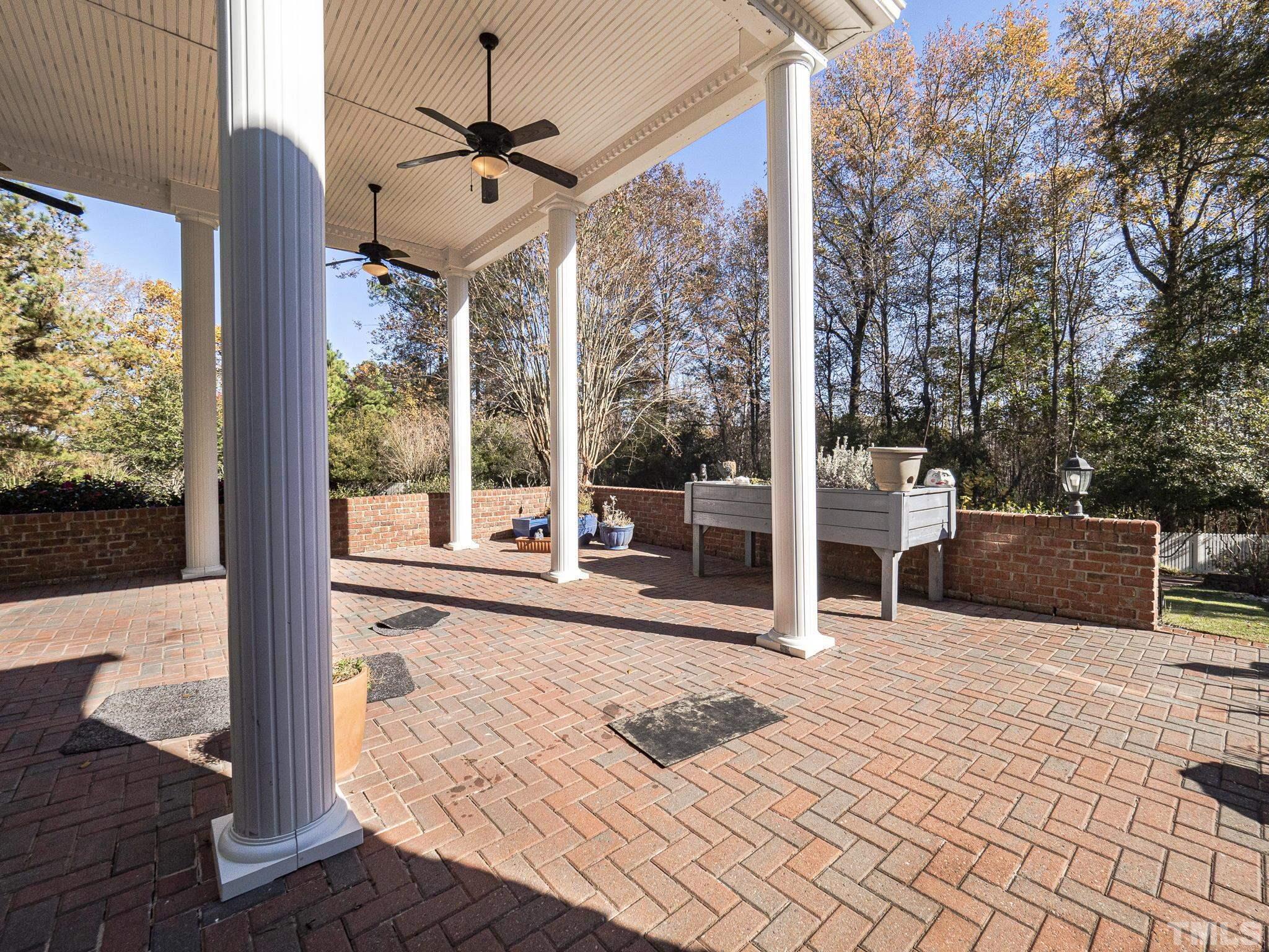 726 Pope Lake Road Angier, NC 27501 - Photo 26 of 29 a view of a terrace with wooden floor and outdoor space