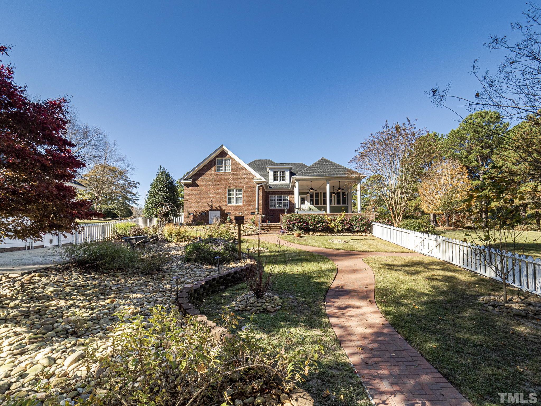 726 Pope Lake Road Angier, NC 27501 - Photo 27 of 29 a front view of house with yard and green space