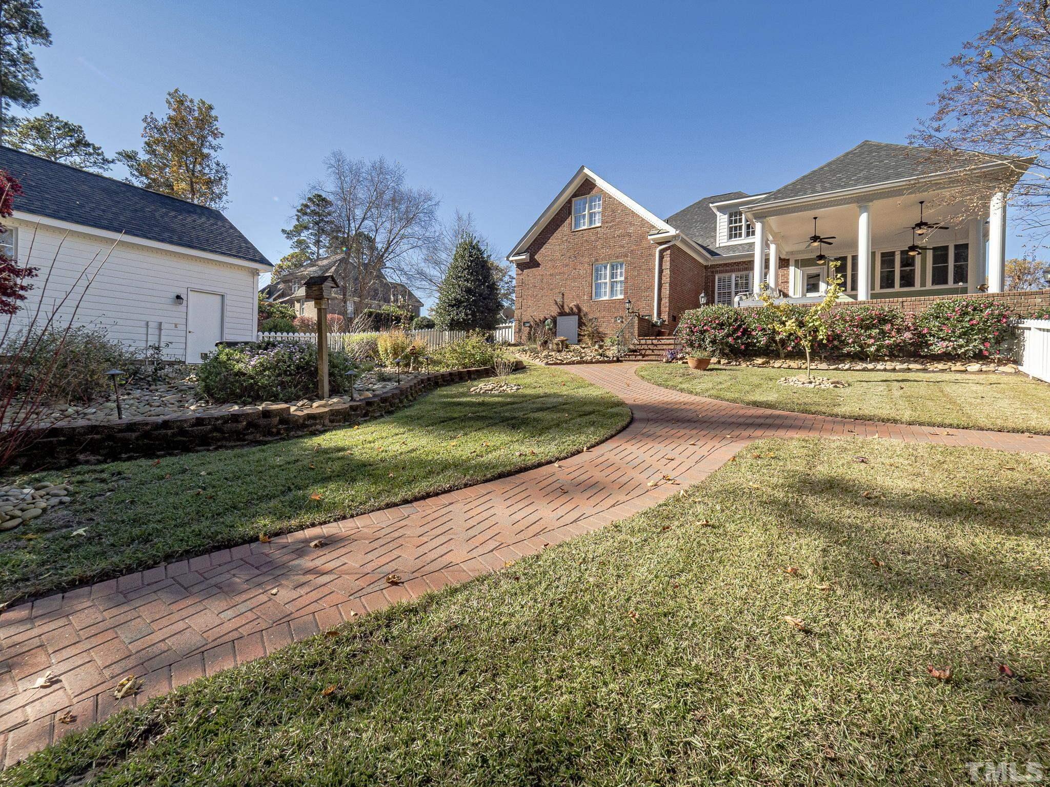 726 Pope Lake Road Angier, NC 27501 - Photo 4 of 29 a front view of a house with a yard