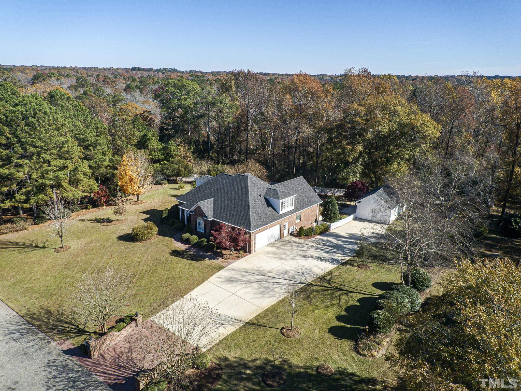 726 Pope Lake Road Angier, NC 27501 - Photo 7 of 29 a view of backyard with wooden fence