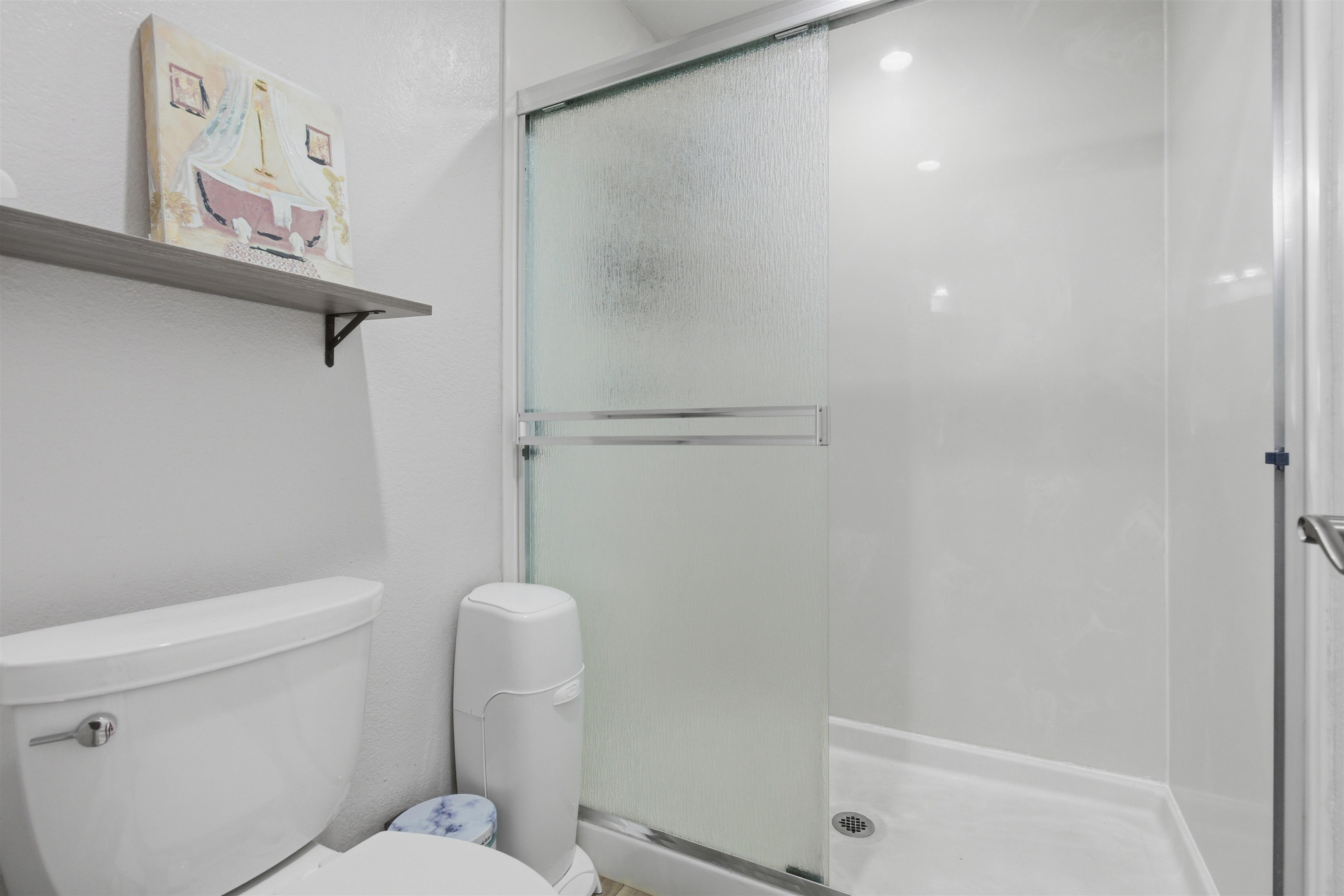 370 Sequim Common Fremont, CA 94539 - Photo 5 of 28 a bathroom with a shower a toilet and sink