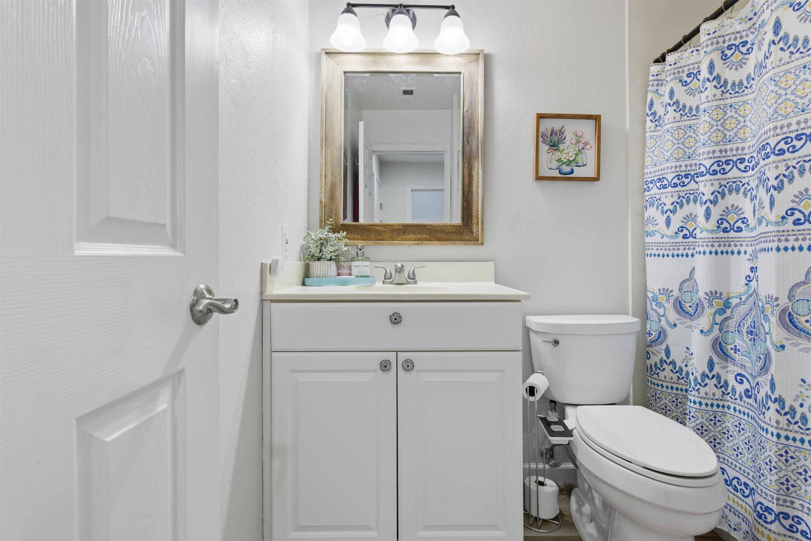 370 Sequim Common Fremont, CA 94539 - Photo 7 of 28 a bathroom with a sink mirror toilet and vanity