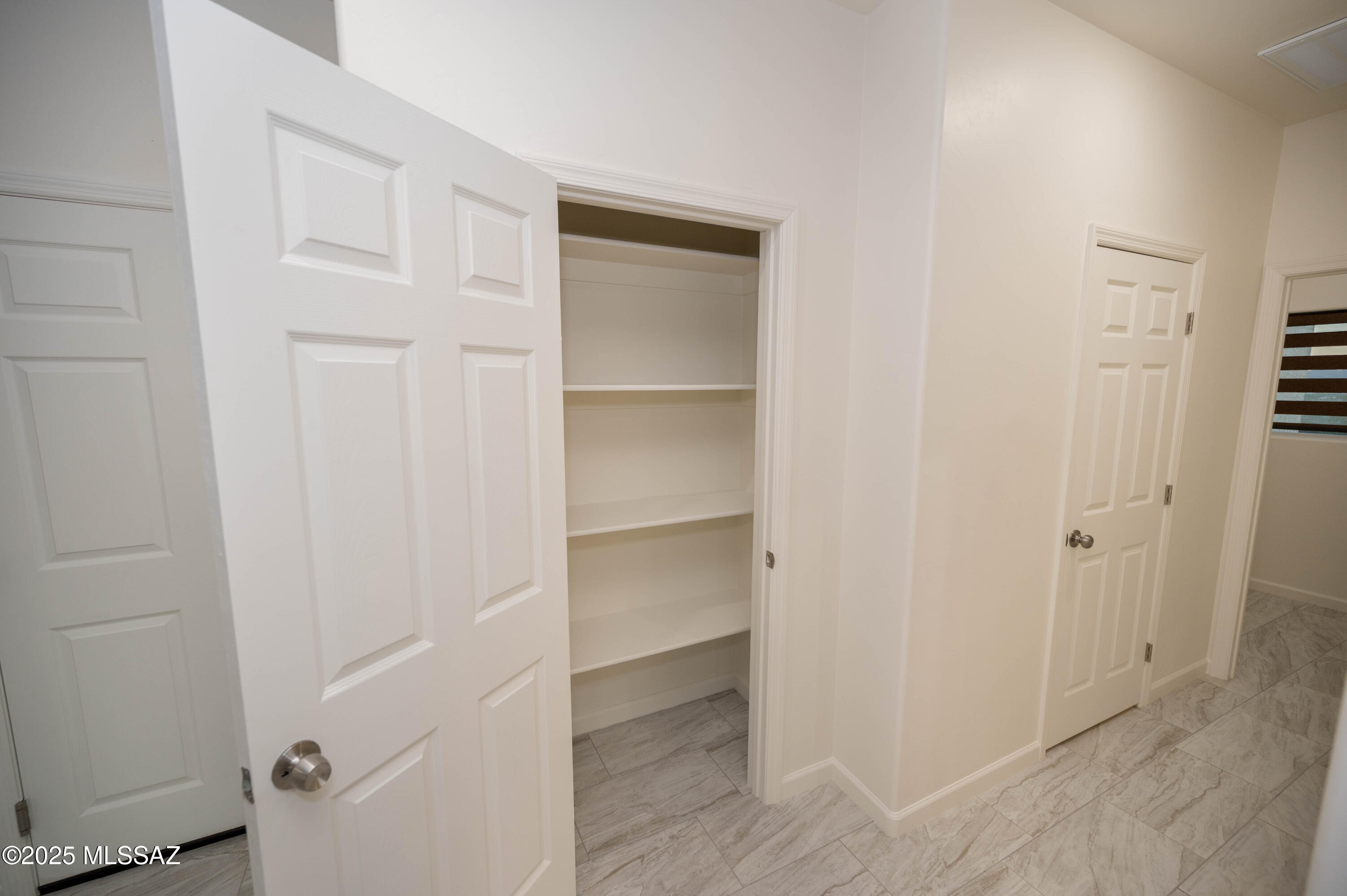 497 Calle Cipres Rio Rico, AZ 85648 - Photo 38 of 50 a view of an empty walk in closet