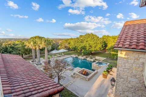 a view of a terrace with sitting area