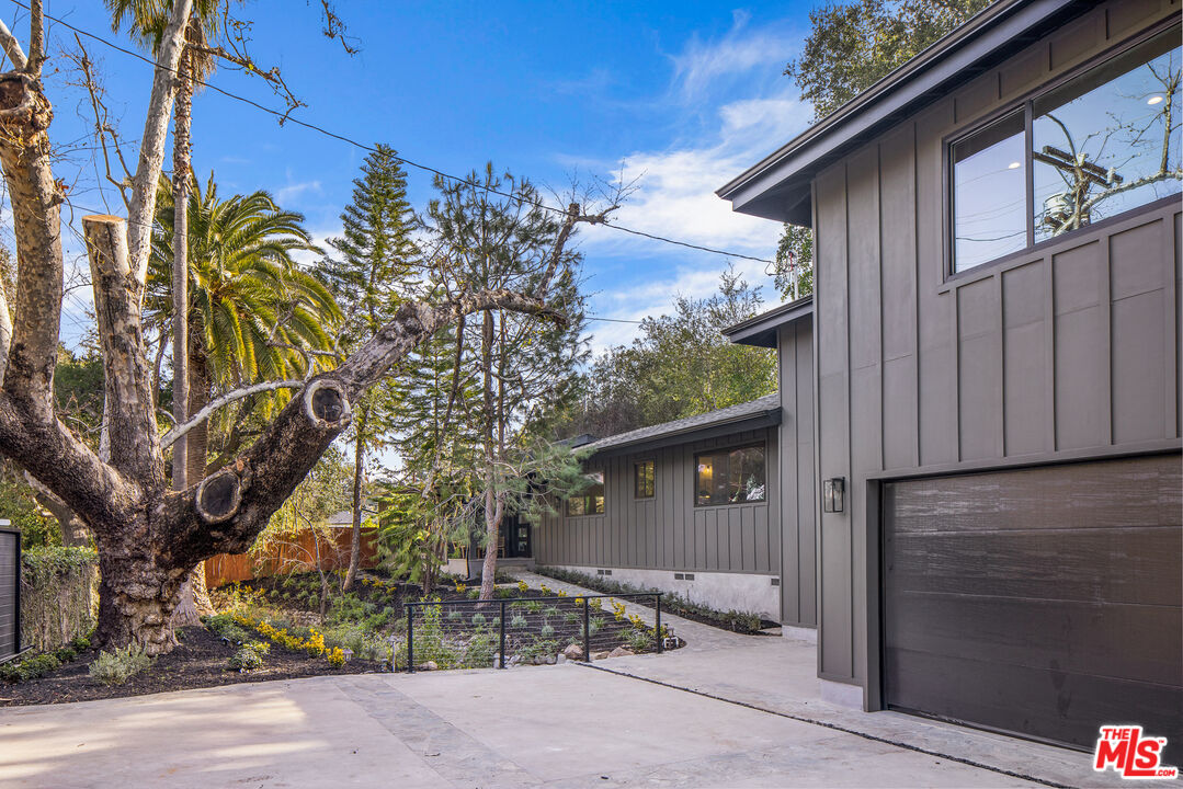 17140 Rancho Street Encino, CA 91316 - Photo 2 of 28 a house view with a outdoor space