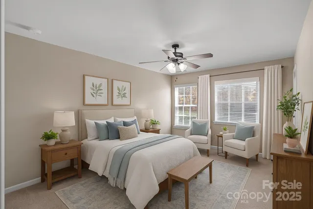 a view of a patio with couches and table and chairs and potted plants