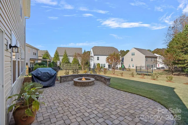 a front view of a house with a large window