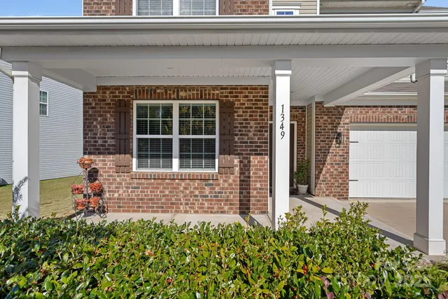a picture of a bench in front of a building