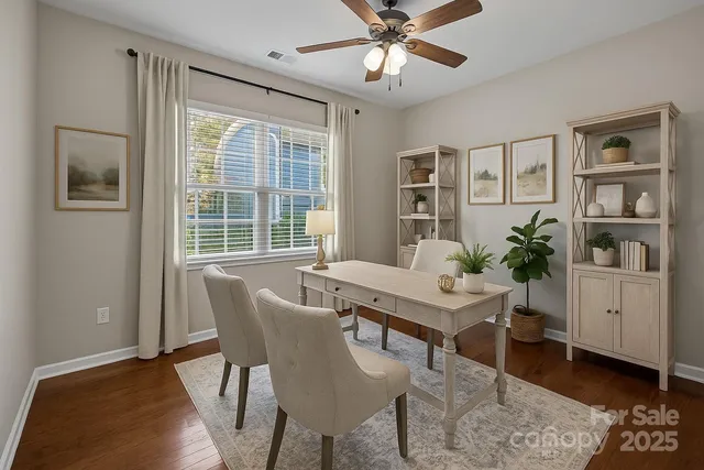 a workspace with furniture and window