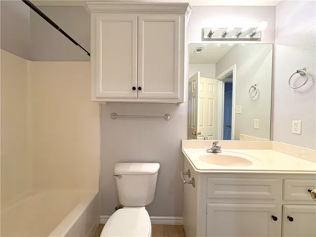 a bathroom with a sink and a toilet