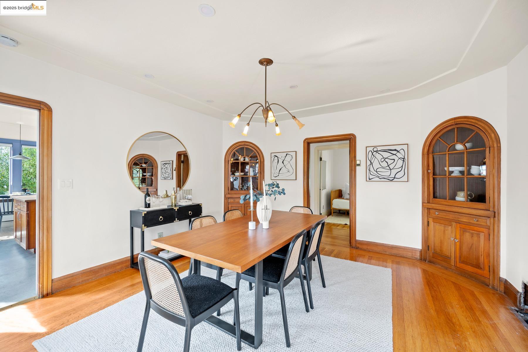 1614 Posen Avenue Berkeley, CA 94707 - Photo 15 of 60 a view of a dining room with furniture window and wooden floor