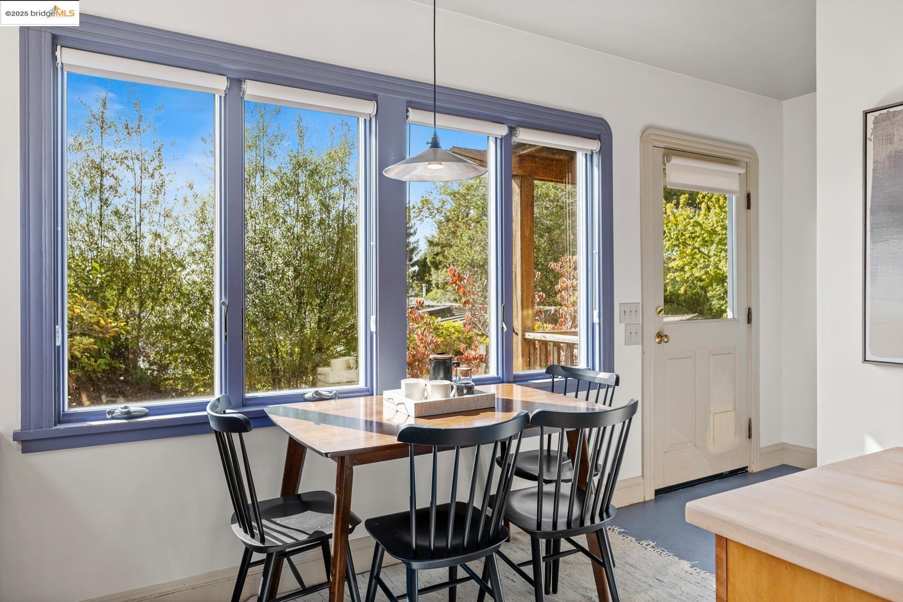1614 Posen Avenue Berkeley, CA 94707 - Photo 20 of 60 a view of a dining room with furniture window and outside view