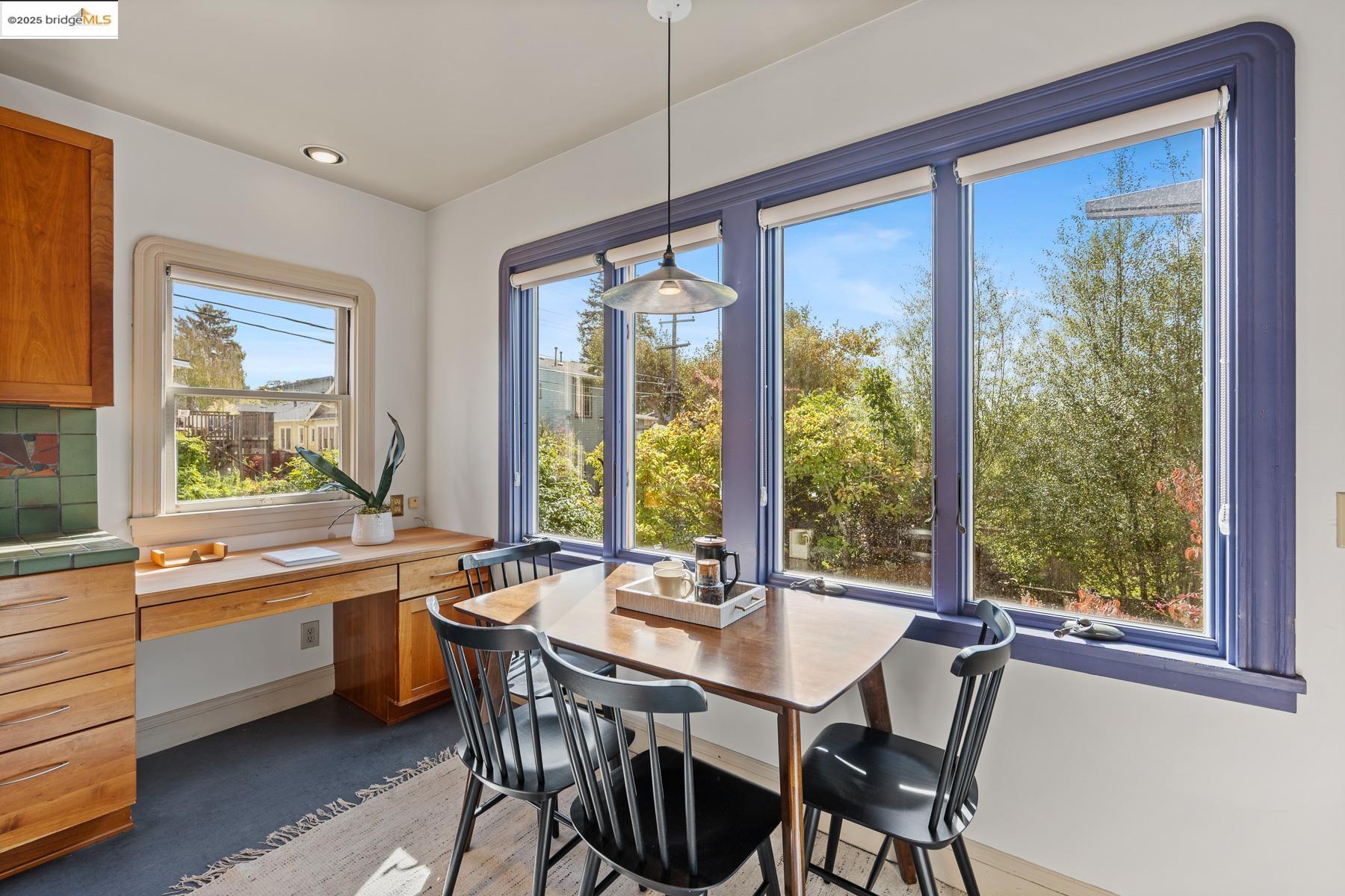 1614 Posen Avenue Berkeley, CA 94707 - Photo 22 of 60 a view of a dining room with furniture window and outside view