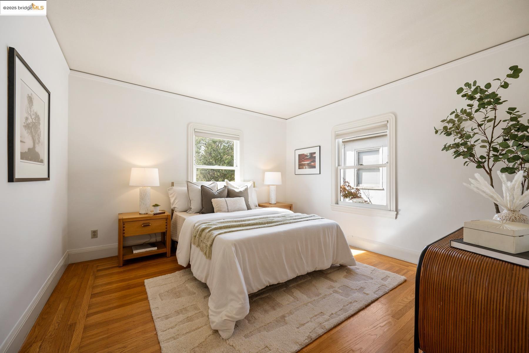 1614 Posen Avenue Berkeley, CA 94707 - Photo 32 of 60 a bedroom with a large bed and a window