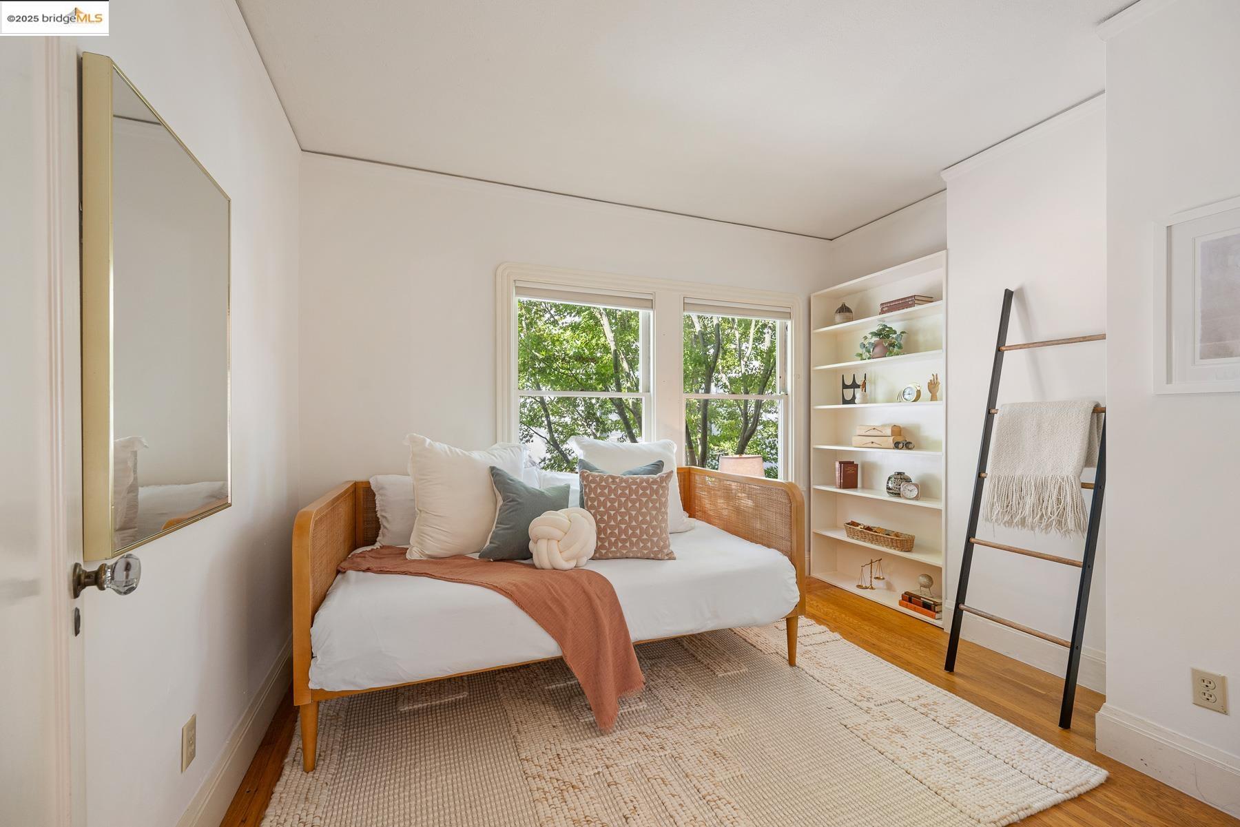 1614 Posen Avenue Berkeley, CA 94707 - Photo 33 of 60 a living room with furniture and a large window