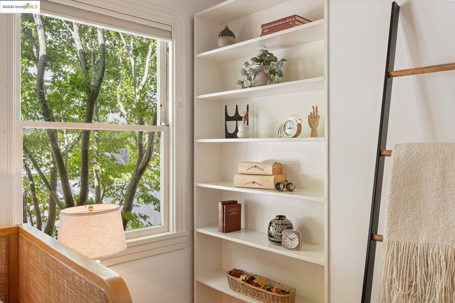 1614 Posen Avenue Berkeley, CA 94707 - Photo 34 of 60 a view of kitchen cabinets with wooden floor and window