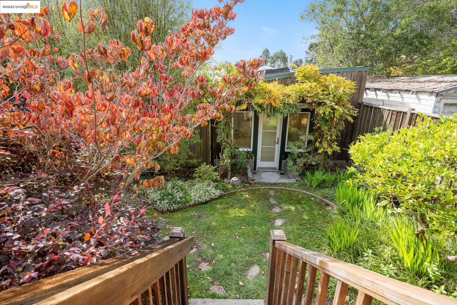 1614 Posen Avenue Berkeley, CA 94707 - Photo 38 of 60 a view of a house with a flower garden