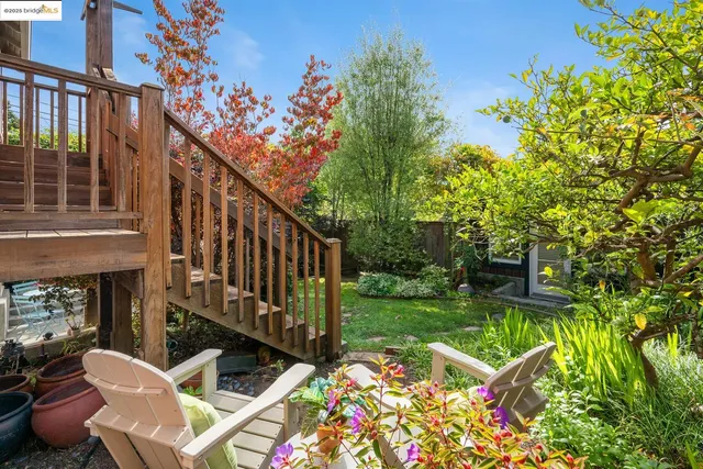 a spacious bedroom with a bed and a book shelf