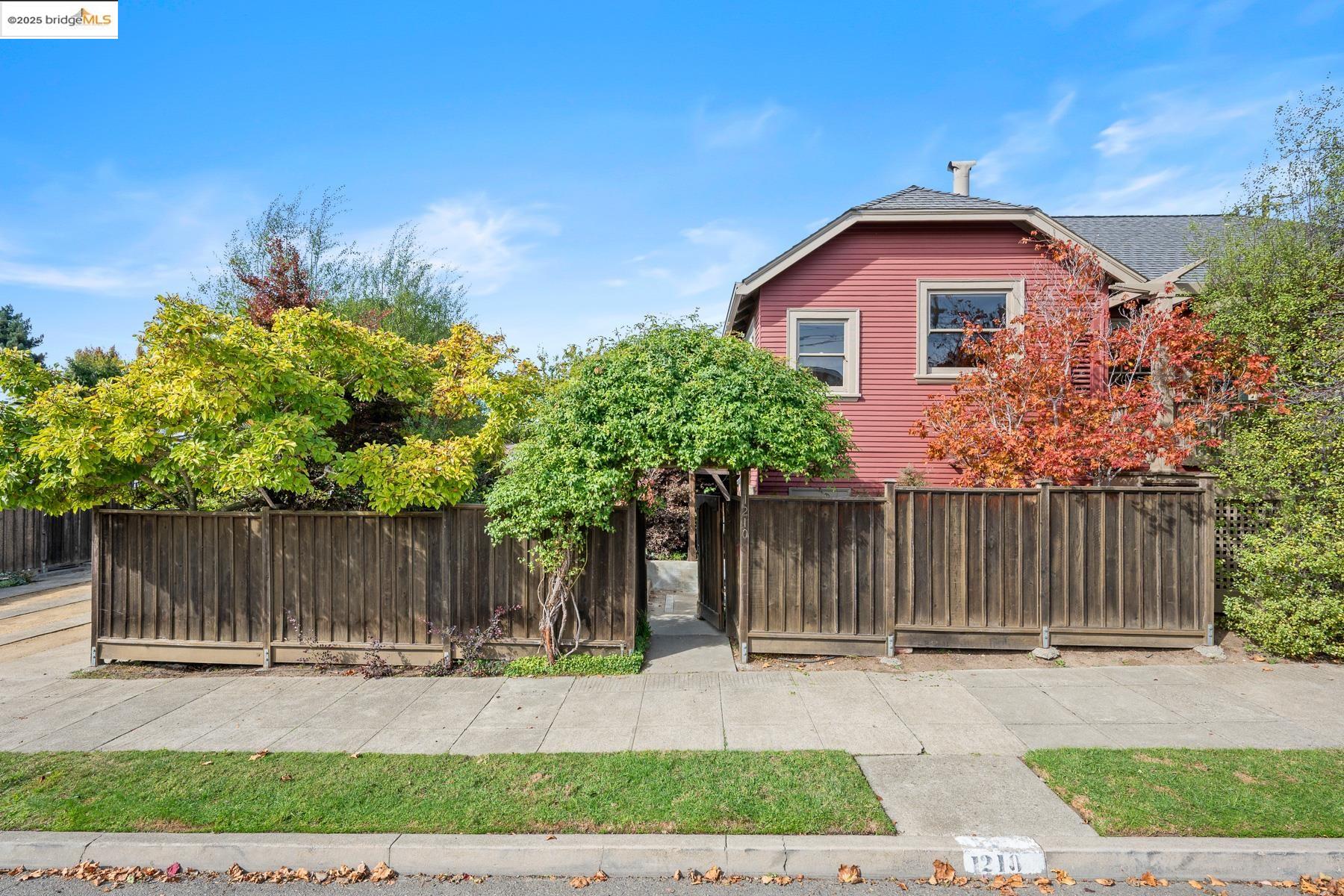 1614 Posen Avenue Berkeley, CA 94707 - Photo 43 of 60 a front view of a house with a yard and garage