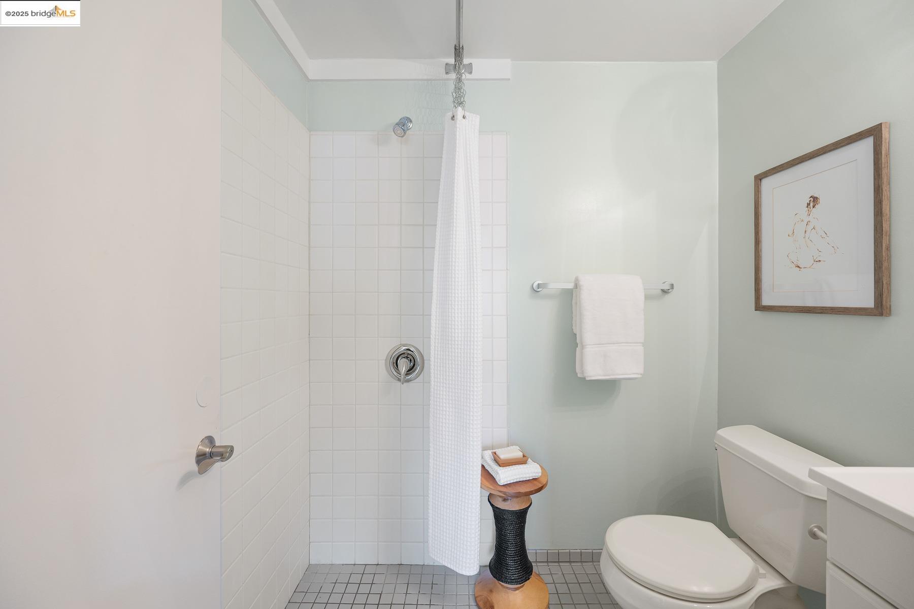 1614 Posen Avenue Berkeley, CA 94707 - Photo 55 of 60 a white toilet sitting next to a bathroom sink