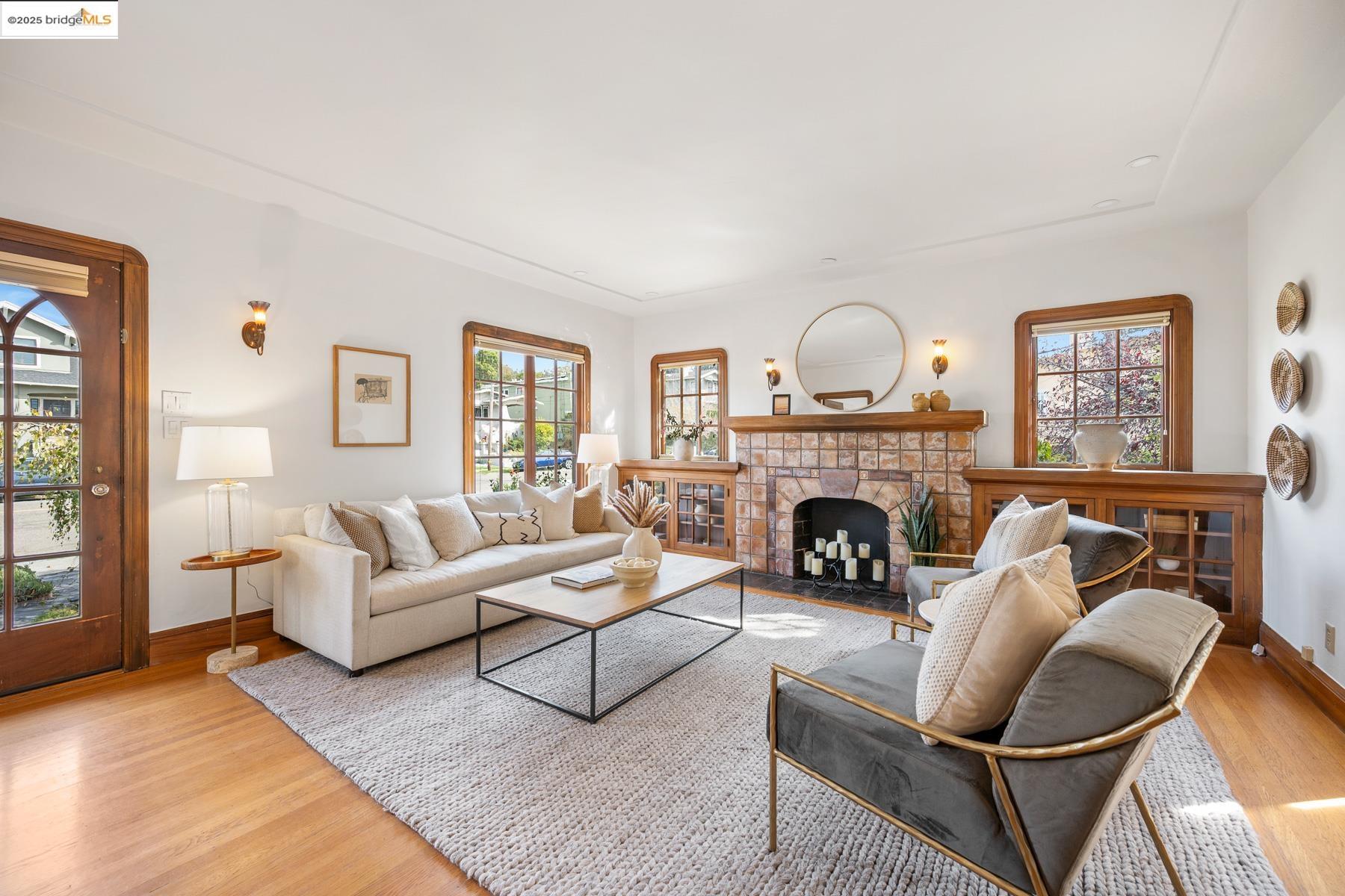 1614 Posen Avenue Berkeley, CA 94707 - Photo 6 of 60 a living room with furniture and a fireplace
