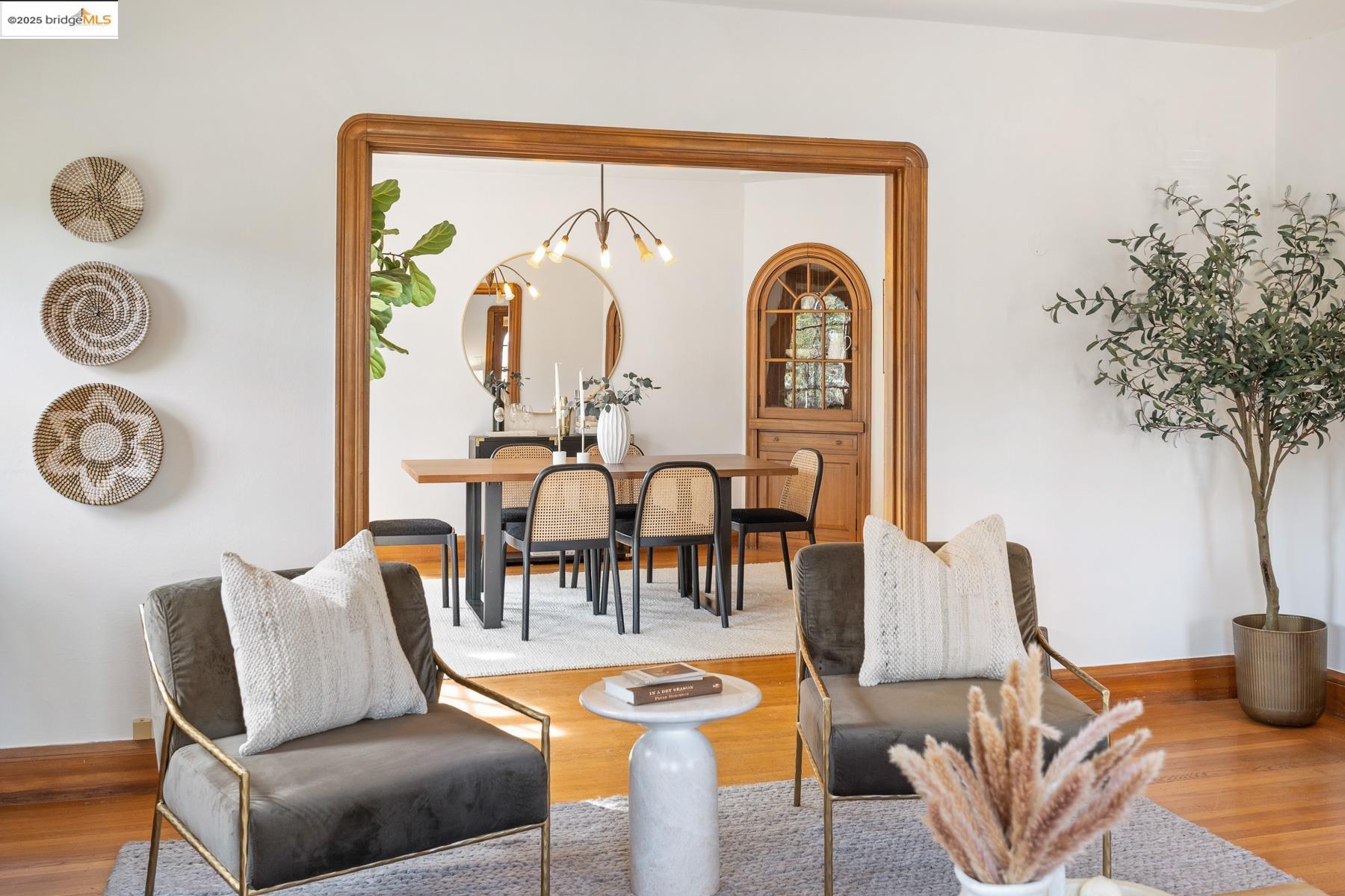 1614 Posen Avenue Berkeley, CA 94707 - Photo 9 of 60 a living room with furniture and a clock