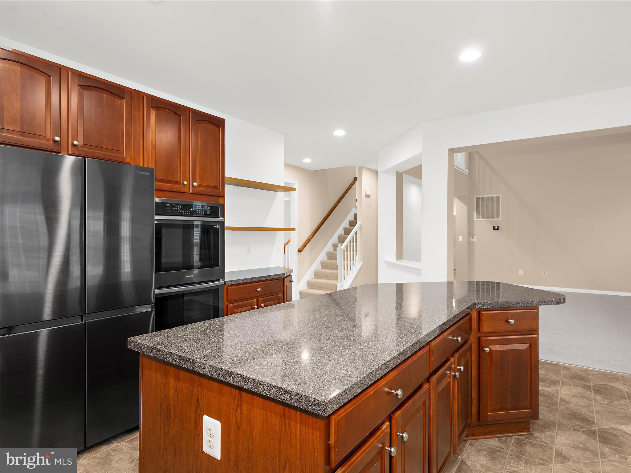 103 Adela Way Chestertown, MD 21620 - Photo 16 of 90 a kitchen with stainless steel appliances granite countertop a refrigerator a stove and a sink