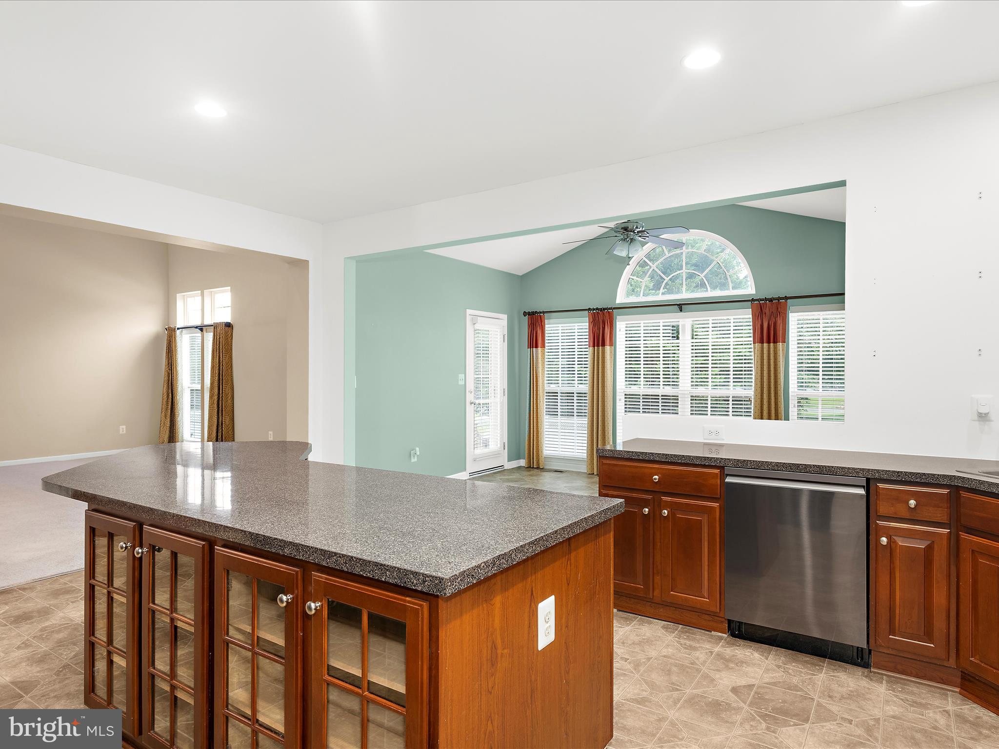 103 Adela Way Chestertown, MD 21620 - Photo 26 of 90 a kitchen with a stove a sink a window and dining table