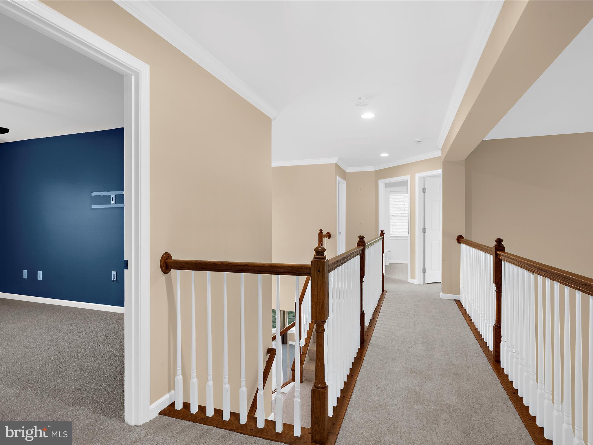 103 Adela Way Chestertown, MD 21620 - Photo 39 of 90 a view of a hallway with wooden floor and stairs
