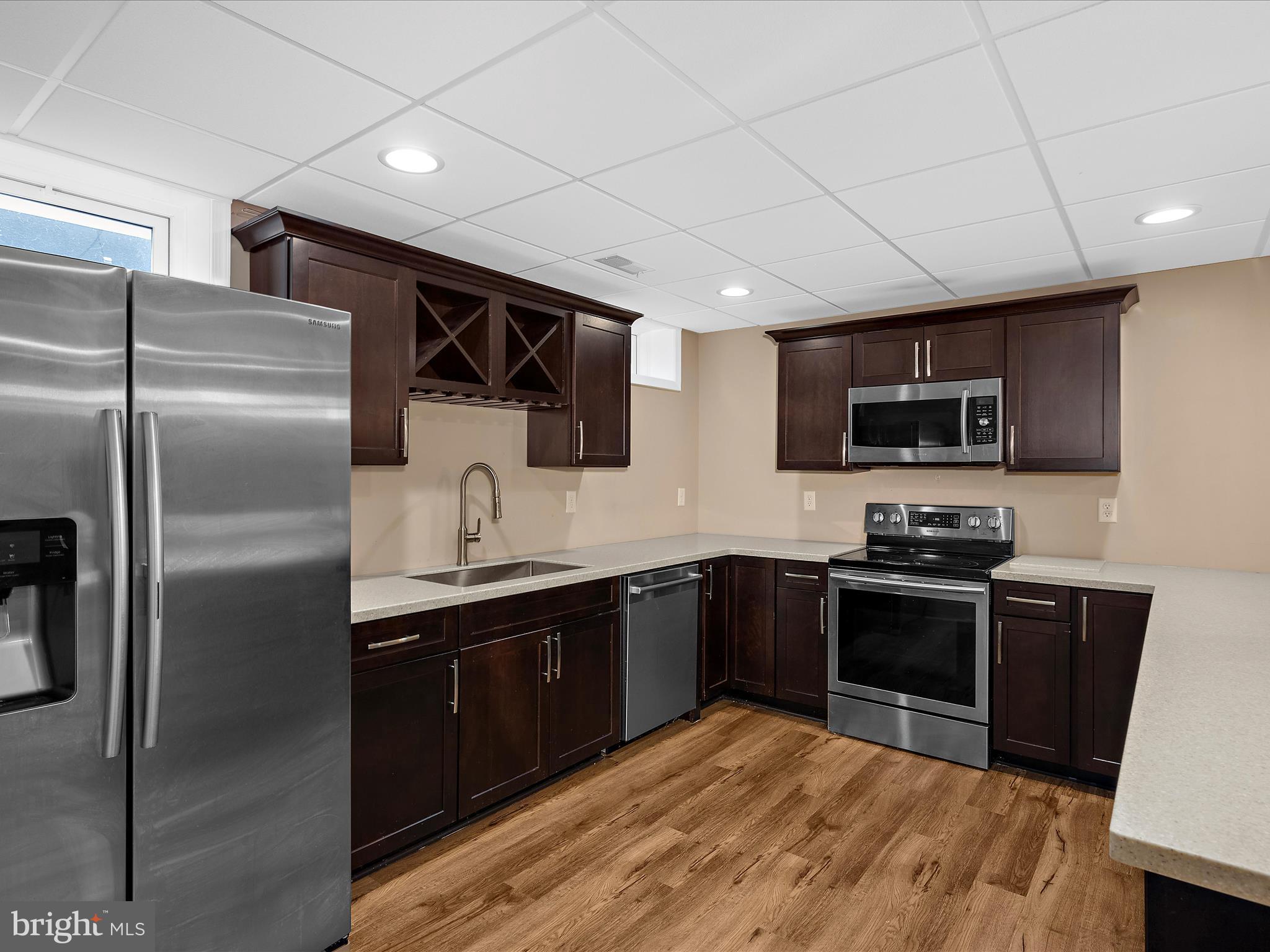 103 Adela Way Chestertown, MD 21620 - Photo 72 of 90 a kitchen with stainless steel appliances granite countertop a sink stove and refrigerator