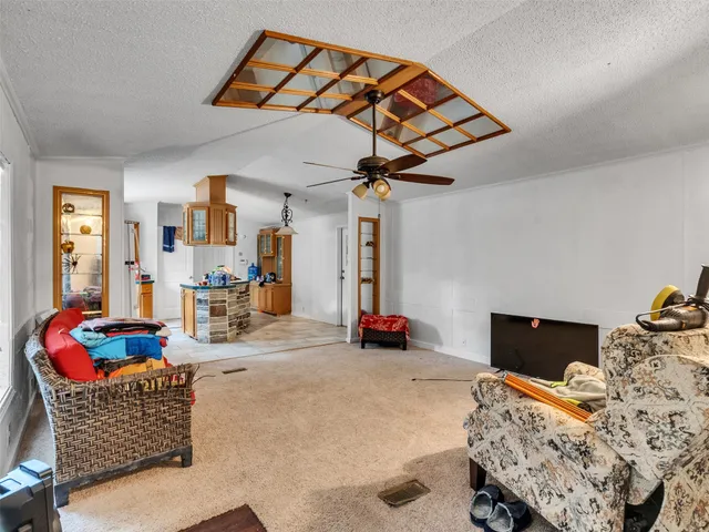 a bedroom with furniture and window